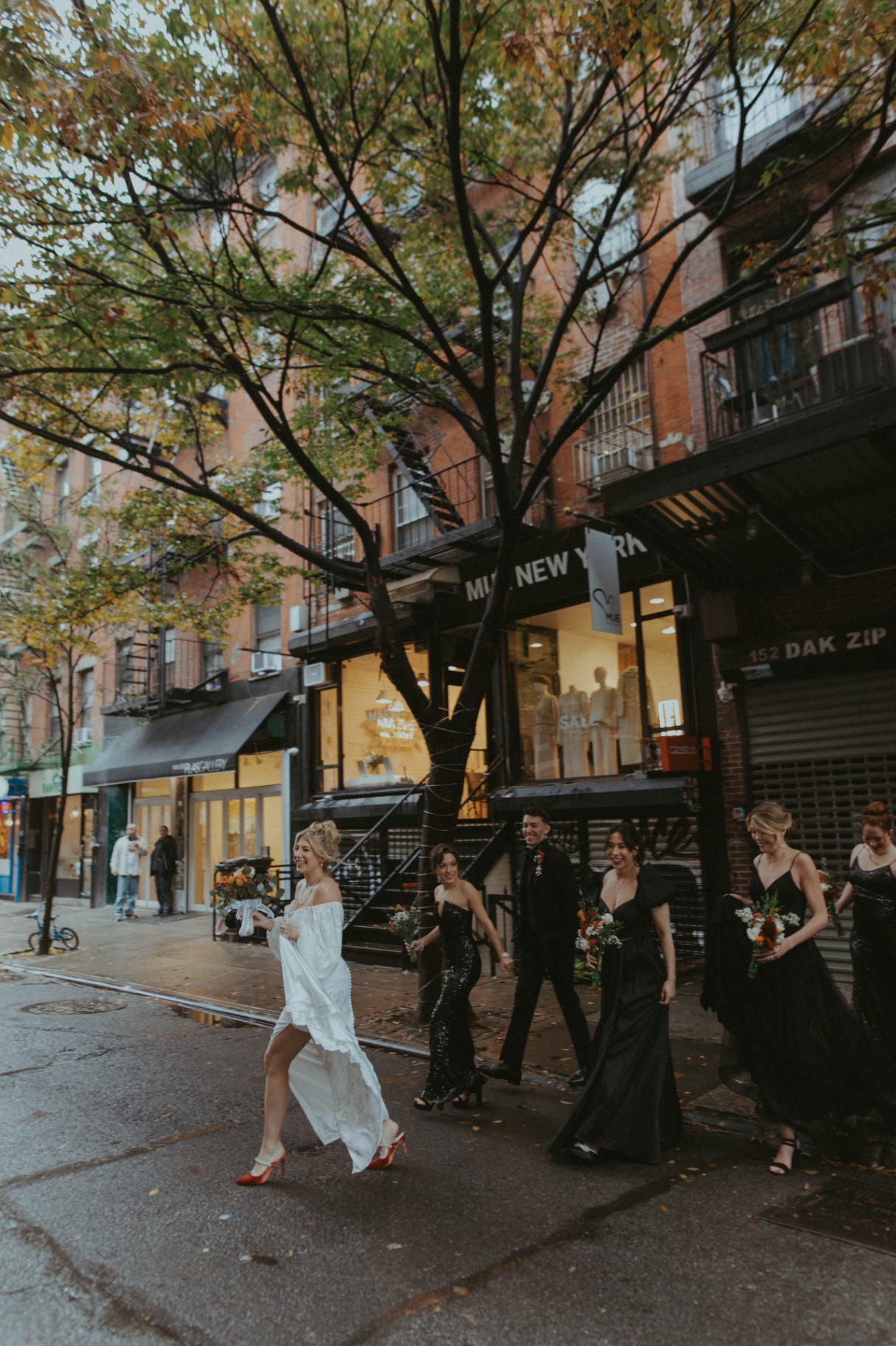 bubu nyc bridal party crossing the street on Orchard Street