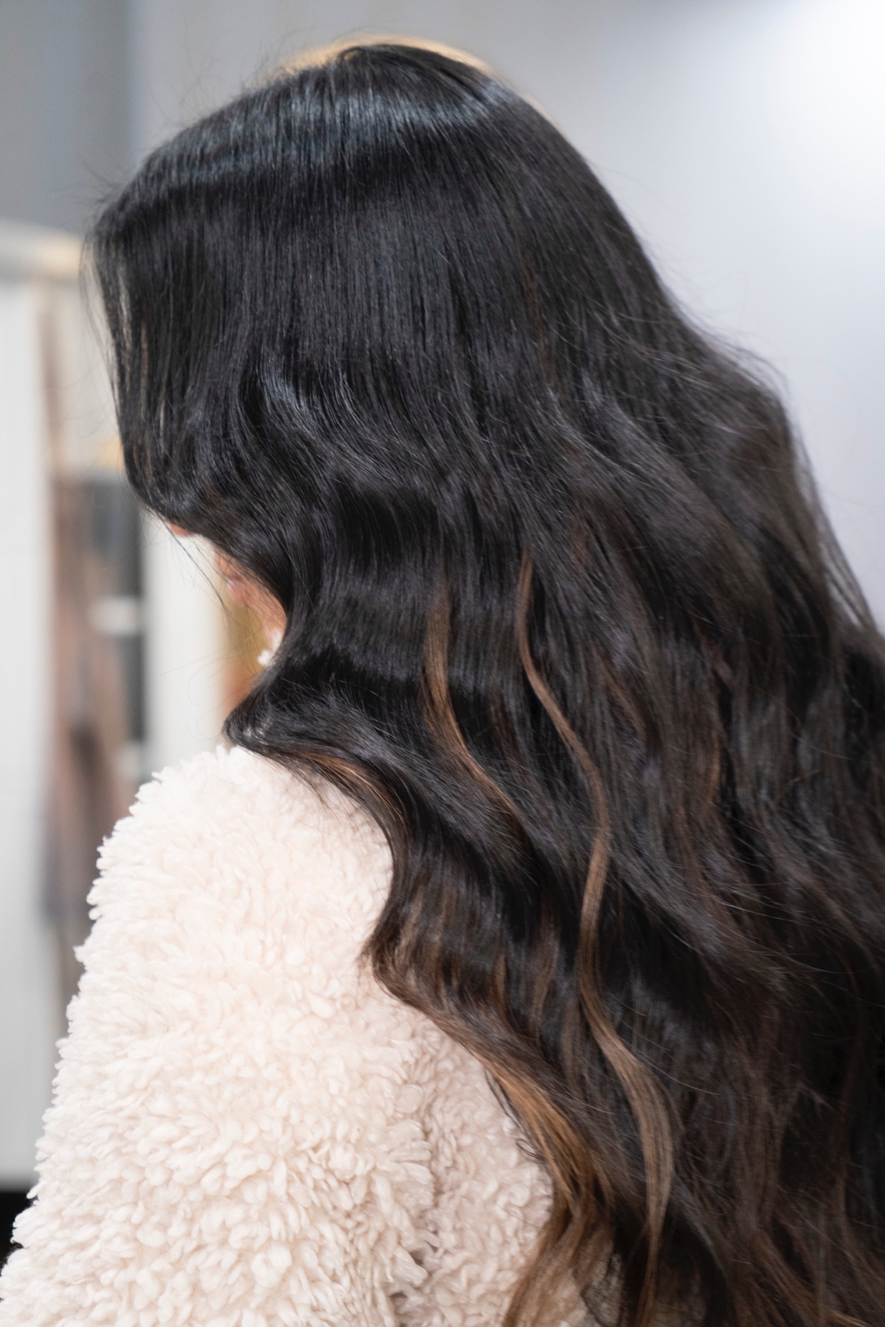 Dark brunette with subtle warm ribbons